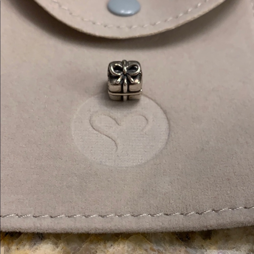 Pandora gift box charm.